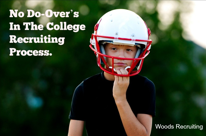 Young football boy in helmet with sad look on face.